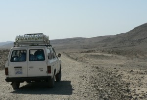 Vehicle transporting drinking water for field work in Afar